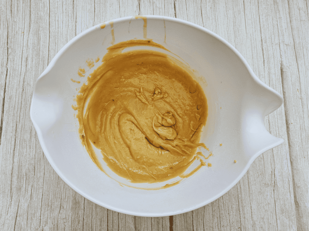 Wet and dry ingredients mixed in the bowl to make the Elegant French Apple Cake