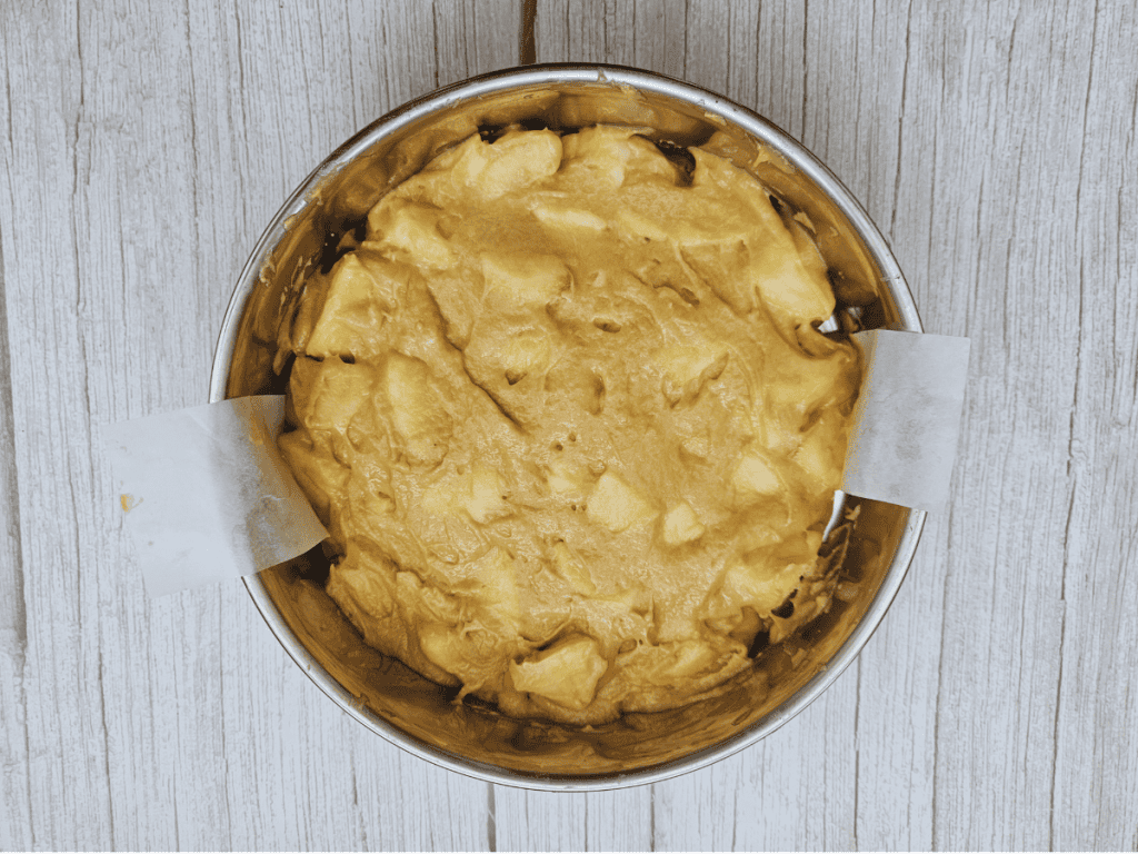 Fold in cubed apples in the batter and pour batter in the baking pan